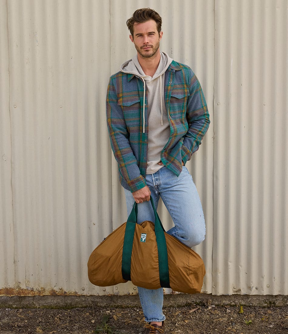 F25_WearitWith_LosAlamosTown_TravelDude_1987.jpg